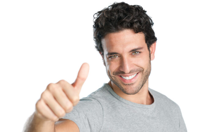 Happy,Smiling,Guy,Showing,Thumb,Up,Hand,Sign,Isolated,On blanqueamiento dental en madrid centro